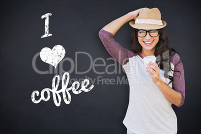 Composite image of brunette with disposable cup