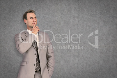 Composite image of thinking businessman