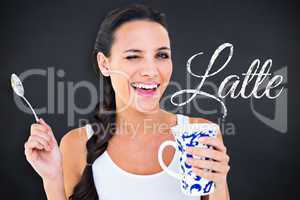 Composite image of pretty brunette having cup of tea