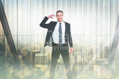 Composite image of happy businessman posing and gesturing