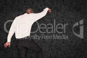 Composite image of businessman stepping