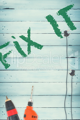 Fix it against tools on wooden background