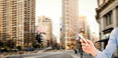 Composite image of man using smartphone