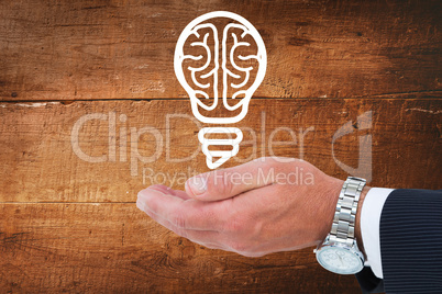 Composite image of businessman in suit offering handshake