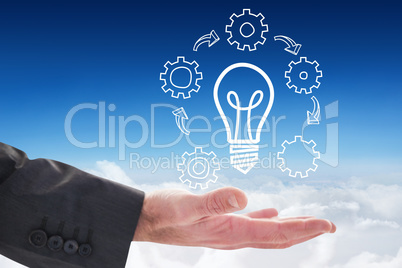 Composite image of businessman holding hand out in presentation Composite image of businessman holding hand out in presentation
