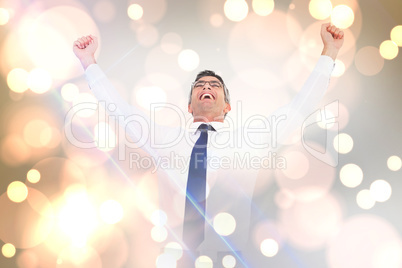 Composite image of excited businessman with glasses cheering Composite image of excited businessman with glasses cheering