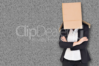 Composite image of businesswoman with box over head