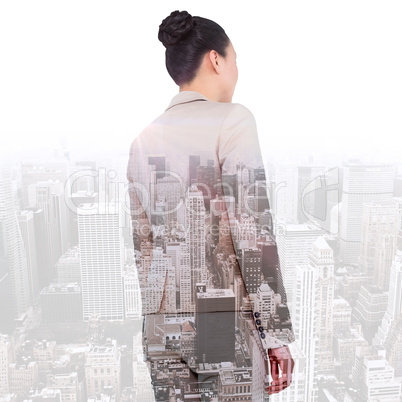 Composite image of asian businesswoman walking