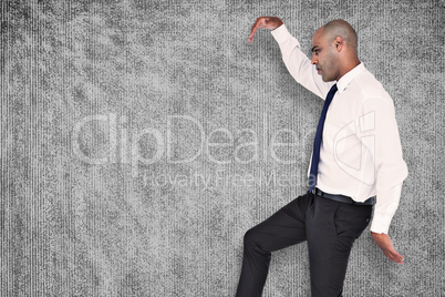 Composite image of businessman stepping