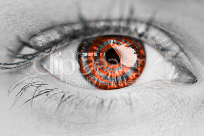 Composite image of close up of female blue eye