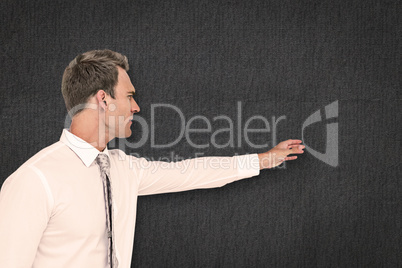 Composite image of businessman reaching