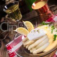 white asparagus served with a fine hollandaise sauce and Poache