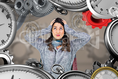 Composite image of anxious pretty brunette wearing winter clothe