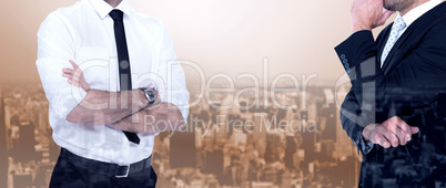 Composite image of smiling businessman with arms crossed