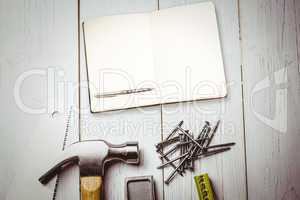 Composite image of notebook and pen