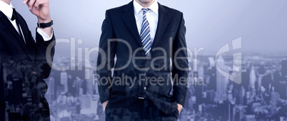 Composite image of smiling businessman standing with hands in po