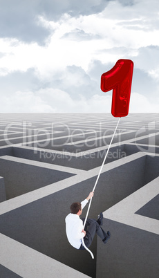 Composite image of businessman flying with balloon