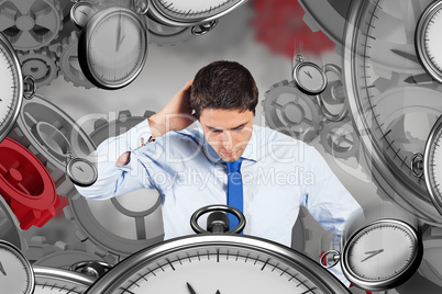 Composite image of thinking businessman scratching head