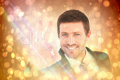 Composite image of businessman smiling and making ok sign