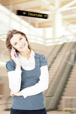 Composite image of happy blonde on the phone