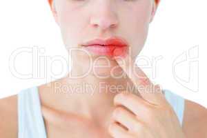 Composite image of pretty woman with finger on lip