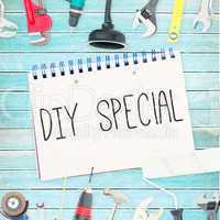Diy special against tools and notepad on wooden background