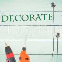 Decorate  against tools on wooden background