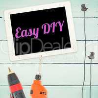 Easy diy against tools and tablet on wooden background