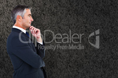 Composite image of elegant businessman in suit posing