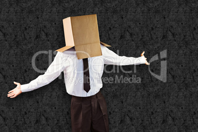 Composite image of anonymous businessman with arms out