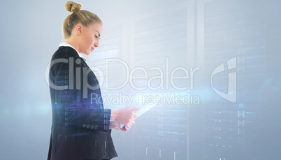 Composite image of businesswoman holding tablet Composite image of businesswoman holding tablet