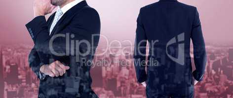 Composite image of rear view of handsome businessman