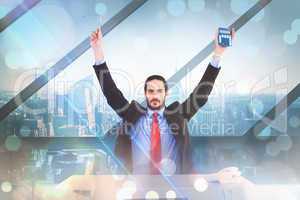 Composite image of businessman holding up reading glasses and ca