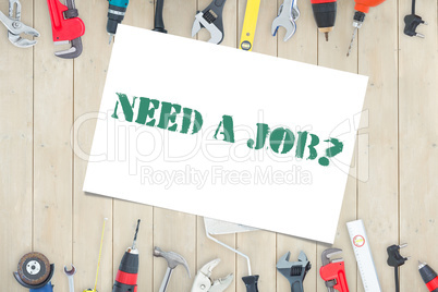 Need a job? against diy tools on wooden background