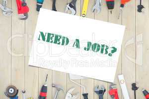 Need a job? against diy tools on wooden background