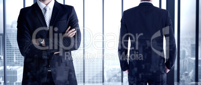 Composite image of rear view of handsome businessman