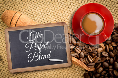 Composite image of red cup of coffee