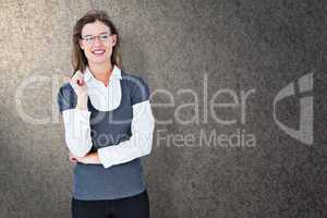 Composite image of smiling woman looking at camera