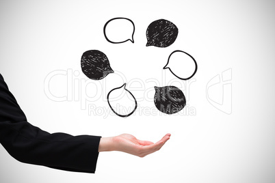 Composite image of businesswomans hand presenting Composite image of businesswomans hand presenting