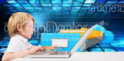 Composite image of cute boy using laptop