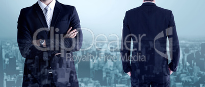 Composite image of rear view of handsome businessman