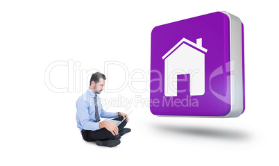 Composite image of cheerful businessman sitting on the floor usi