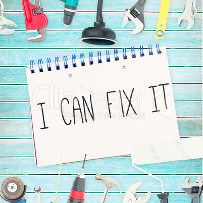 I can fix it against tools and notepad on wooden background