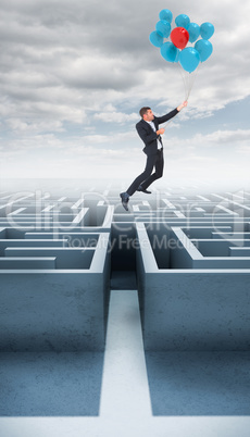 Composite image of businessman flying with balloon Composite image of businessman flying with balloon