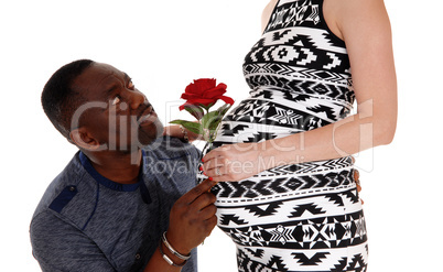 Black man wondering about baby belly.