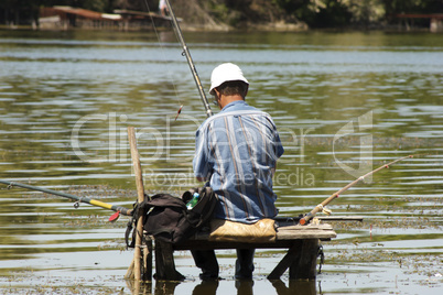 fisherman on the bridge