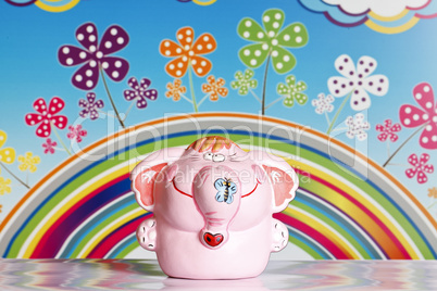 Funny elephant on a rainbow background