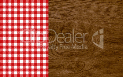 Holzhintergrund mit Tischdecke rot weiß