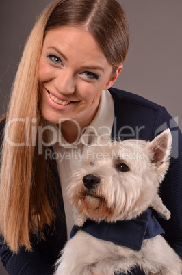Smiling girl and Westie dog