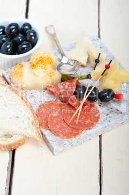 mix cold cut on a stone with fresh pears mix cold cut on a stone with fresh pears